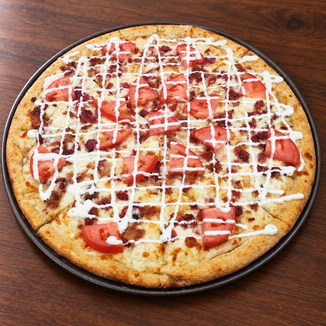 Tomato bacon ranch pizza.