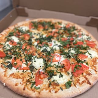 Tomato basil white pizza