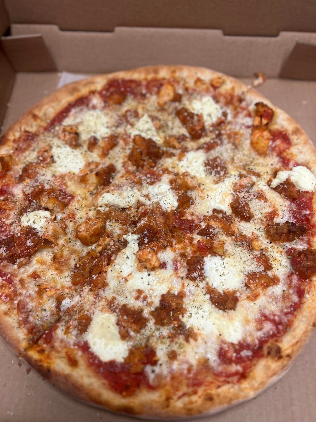 Chicken parmigiana pizza.